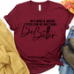 In a World Where You Can Be Anything Be Better T Shirt